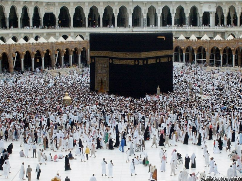 The Holy Kabah, Station of Abraham (golden blond matter on the left), Hicr Esmael (right to Kabah) and the muslims from every counrty circumambulating the Kabah in the Masjed al-Haraam in Mecca city of Saudi Arabia.
